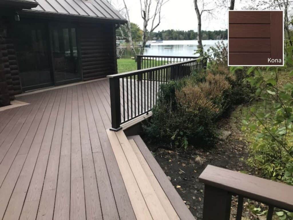 Wraparound deck built on a lake home using TimberTech Kona decking for the floor and drink rail.