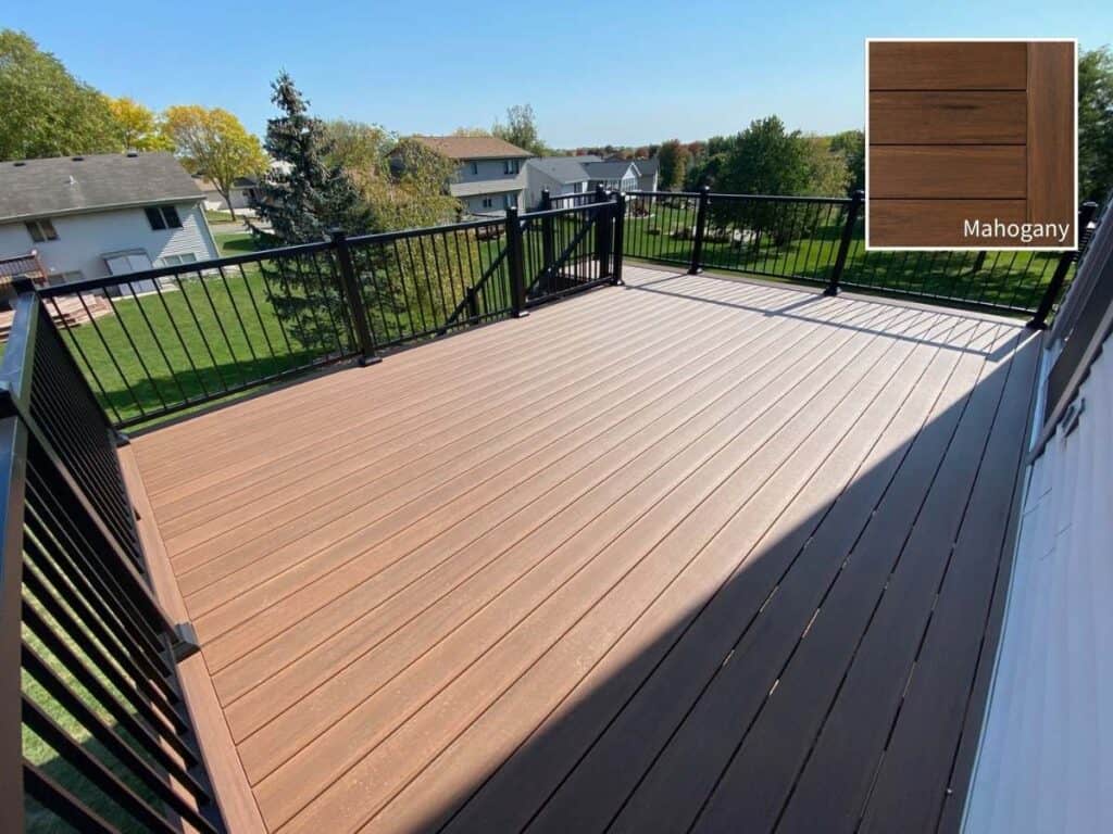 TimberTech PVC deck built with Mahogany decking and a Black Impression Rail.